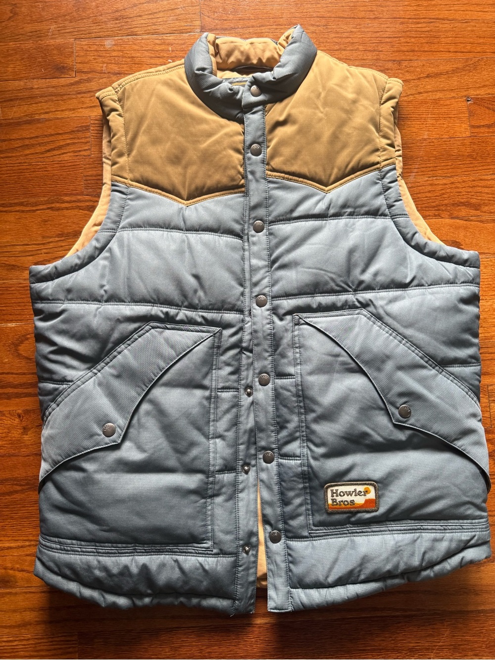 Howler Brothers Two-Tone Puffer Vest in Light Blue and Tan